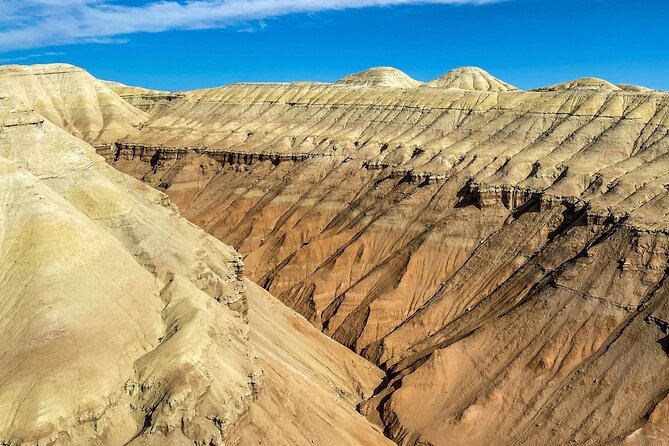Singing dunes & Aktau mountains group tour to Altyn Emel - Katutau: rough volcanic rock and a welcome lunch